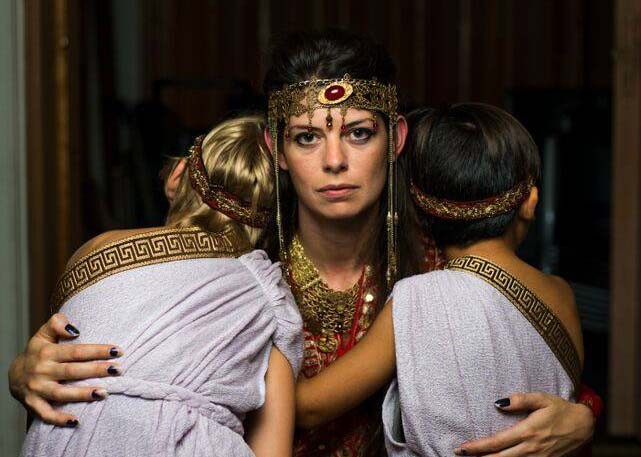 Image of Medea and children from a production of *Medea* directed by Mark Stringham.