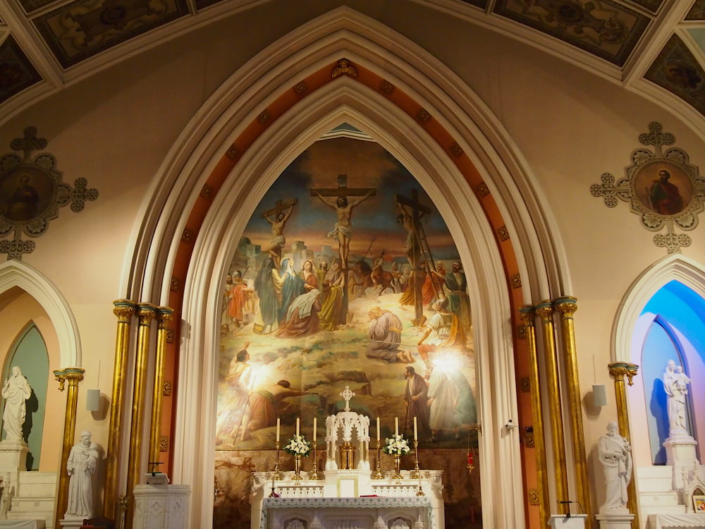 A close up of a painting at the altar
