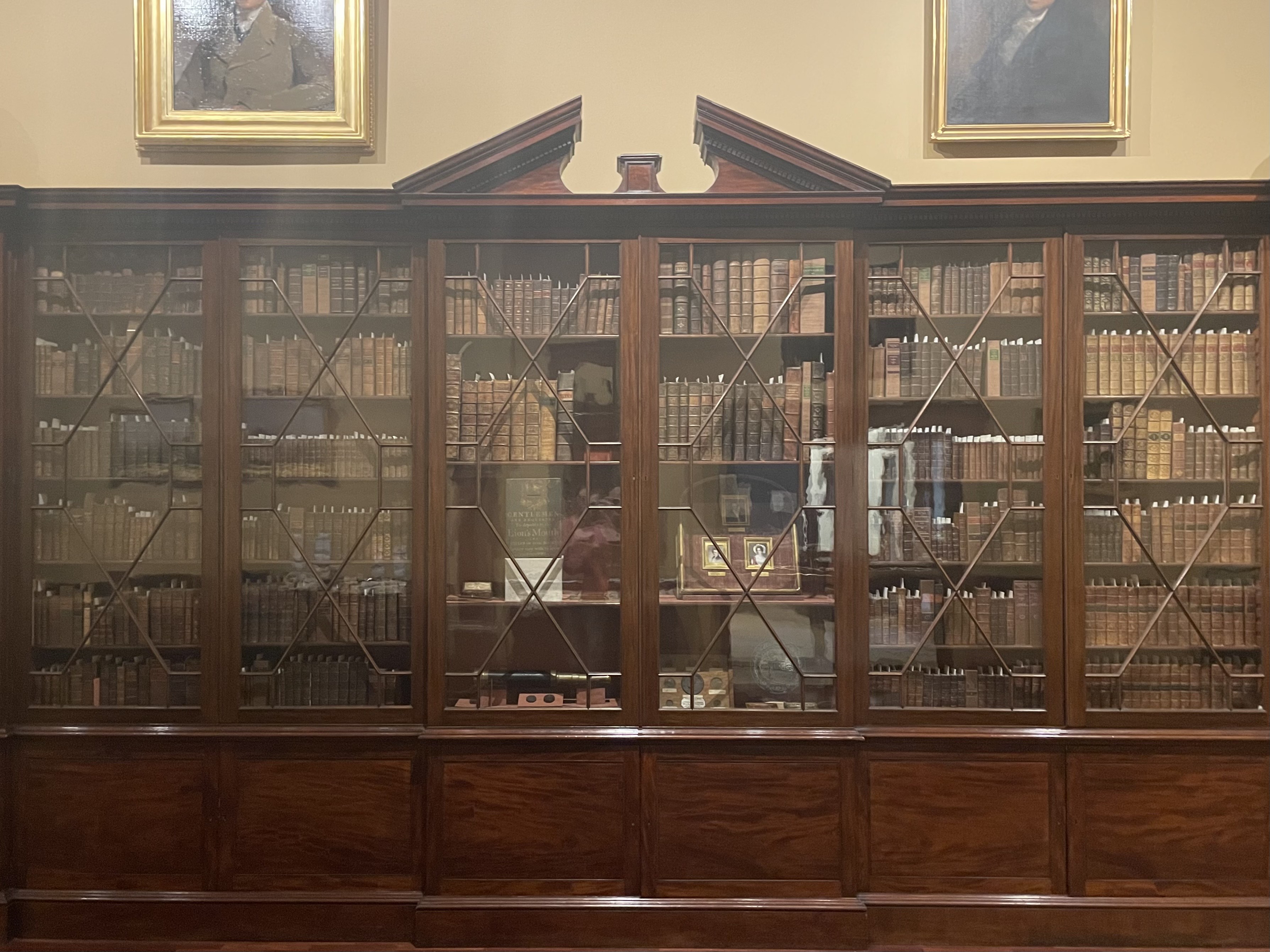 A bookcase of the Loganian Library collection.
