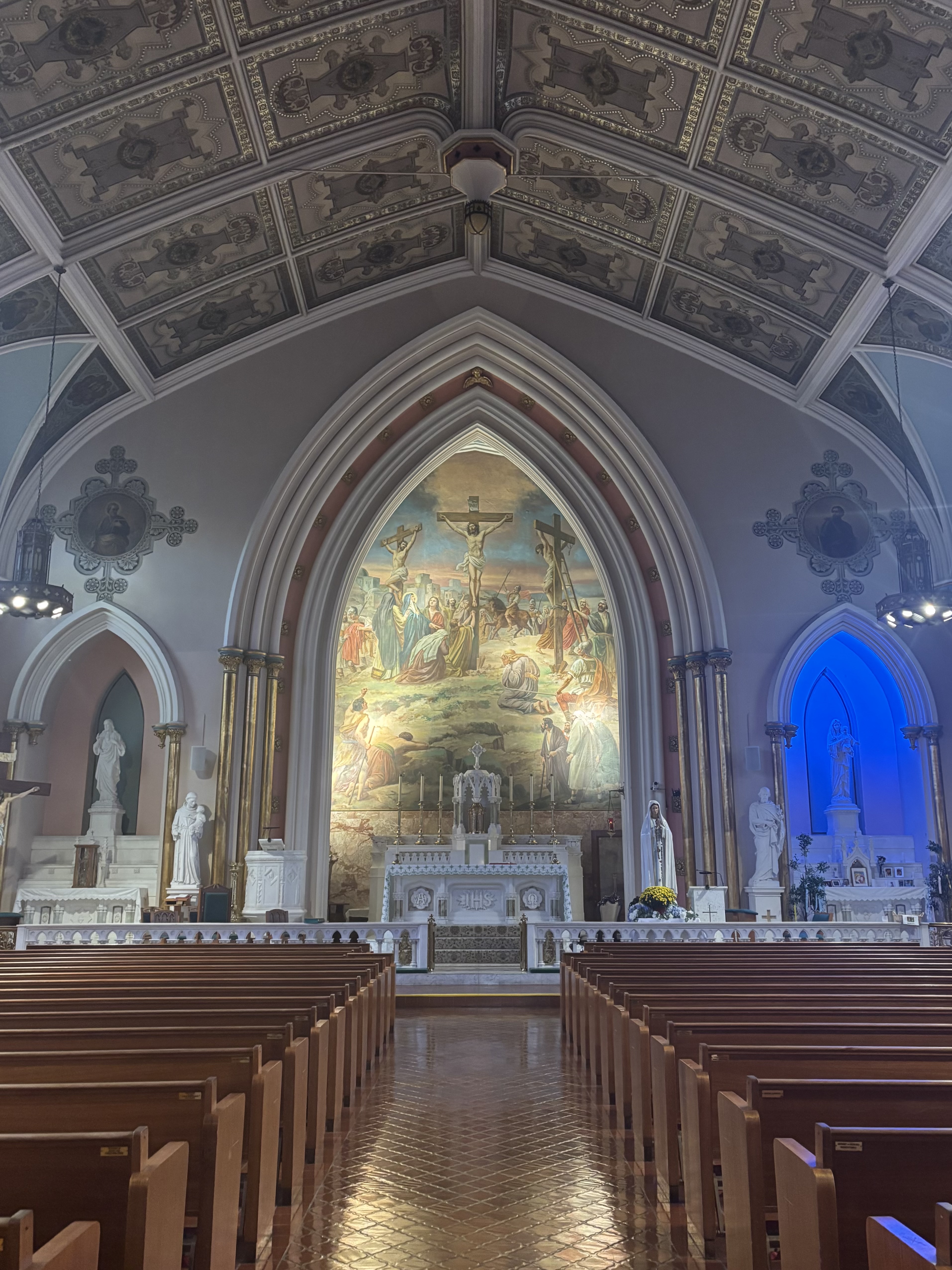 Pews, murals, and other decorative elements inside St Paul Parish